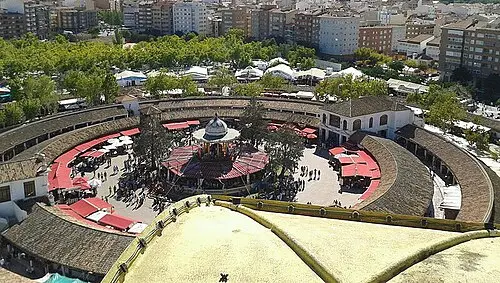 Recinto Ferial & Puerta de Hierros — JPOK (CC BY-SA 4.0) Recinto Ferial & Puerta de Hierros