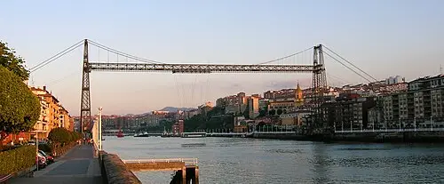Puente Colgante de Vizcaya — Javier Mediavilla Ezquibela Esta imagen tiene una licencia libre (que puedes ver abajo), pero si la usas fuera de los proyectos de Wikimedia, me gustaría que me informaras. Gracias de antemano. Javier Mediavilla Ezquibela, autor de la fotografía This image is under a free license (see below), but if you use it outwith Wikimedia projects, I'd like to be informed. Thanks in advance. Javier Mediavilla Ezquibela, author of the picture (CC BY-SA 2.0) Puente Colgante de Vizcaya